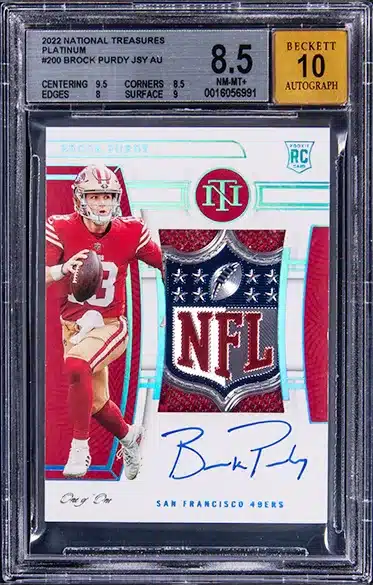 2022 Panini National Treasures Rookie Patch Autograph (RPA) Platinum #200 Brock Purdy Signed NFL Shield Patch Rookie Card (#1/1) - BGS NM-MT+ 8.5